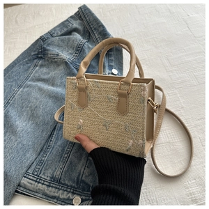 Beige woven crossbody bag with floral embroidery and detachable strap for women