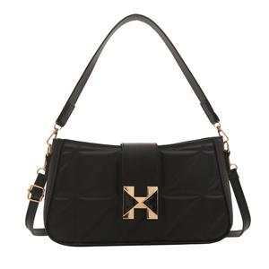 Minimalist black quilted leather shoulder bag with gold H-buckle on white background