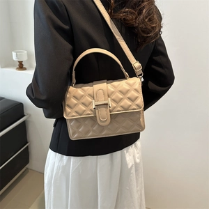 Minimalist beige quilted crossbody bag with gold H clasp and top handle for women