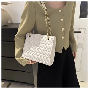 White quilted tote bag with golden chain strap for women, casual office style