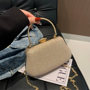 Pochette da sera glitter oro champagne con manico in metallo e tracolla a catena