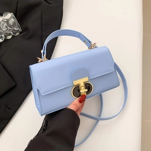 Chic light blue leather crossbody square bag with gold metal buckle and top handle