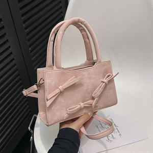 Sac à main vintage rose en cuir avec nœuds 3D et bandoulière réglable pour femme