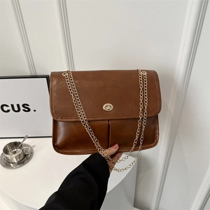 Retro brown PU shoulder bag with gold chain strap and metallic twist lock for women