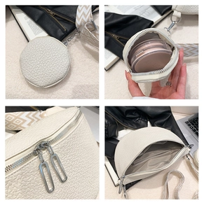 Detail of white embossed saddle bag with woven strap and small round pendant coin purse