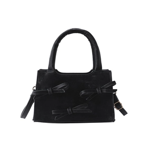 Sac à main chic en daim noir avec nœuds décoratifs et bandoulière amovible