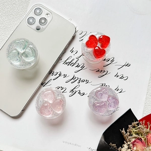Glitter heart phone grip socket in various colors with a 3D triple heart design