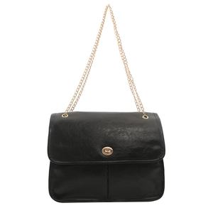 Classic black faux leather shoulder bag with gold chain strap and ring lock on white background