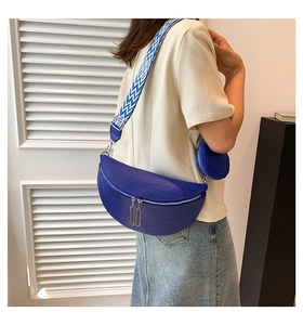 Blue lychee pattern crescent bag with striped wide strap and mini round coin purse