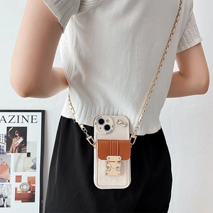 Crossbody iPhone case with cream leather card holder and detachable gold chain strap