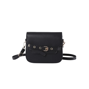 Chic black saddle bag with decorative buckle and gold hardware on white background