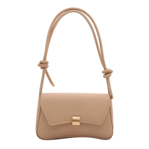 Minimalist beige crossbody square bag with elegant gold buckle and knotted shoulder strap