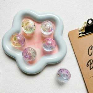Star donut resin phone grip with glitter sequins in pastel gradient colors