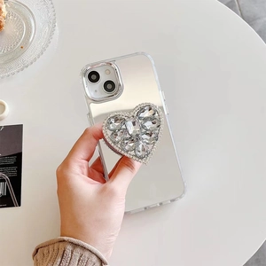 Mirror phone case for iPhone 16 Plus with large luxury diamond heart balloon stand