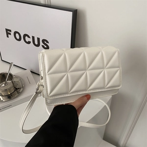 Minimalist white quilted crossbody bag for women with geometric stitching and flap closure