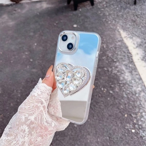 Close-up of sparkling heart-shaped rhinestone phone case with a practical mirror finish