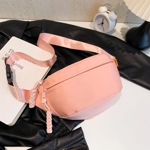 Pink minimalist nylon crossbody fanny pack with woven zipper pull for casual daily use