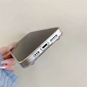 Detail of precise port cutouts and speaker holes on transparent glitter iPhone case