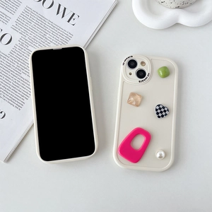 Protective cream case for iPhone with 3D geometric shapes and pearl charm decoration