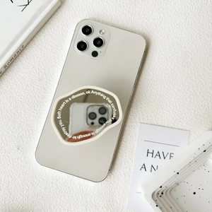 Minimalist phone case with irregular makeup mirror and artistic English typography