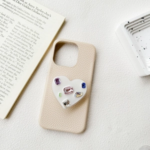 Custodia per telefono in pelle beige di lusso con supporto a cuore in strass lucidi