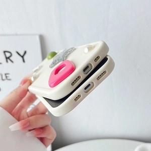 Detailed view of precise speaker and charging port cutouts on creamy silicone phone case