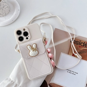 Creamy white iPhone case set with quilted rabbit card holder and crossbody strap details