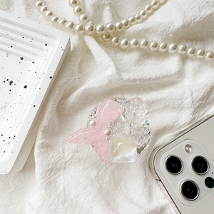 Detail of DIY floral resin phone grip with pink fishtail and pearl embellishments