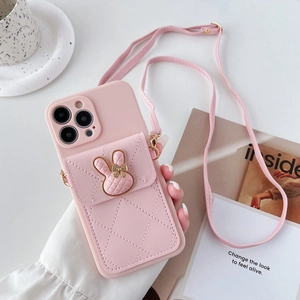Pink quilted iPhone case featuring a rabbit emblem wallet attachment and crossbody strap