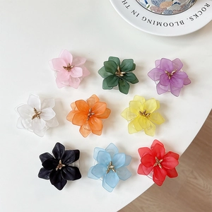 Floral expandable phone socket grip in nine matte colors with golden center accents