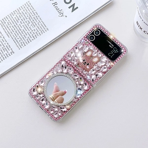 Detail of luxury rhinestone Z Flip case with pink bunny pattern and makeup mirror