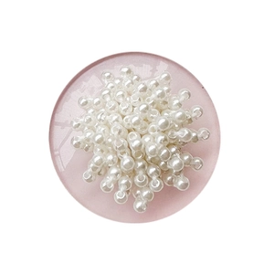 Ins style round glass phone socket with white pearls and pink resin base on white background
