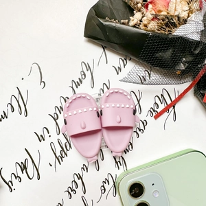 Detailed view of pink shark-shaped phone sockets with a matte silicone texture