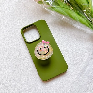 Olive green phone case with smiley face glitter grip and pink bow for iPhone