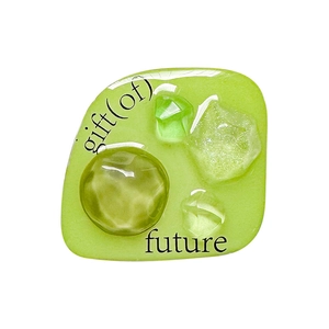 Green irregular resin phone socket grip with crystalline inlay and future text