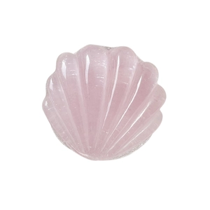 Pink shell-shaped glitter phone grip socket with polished 3D texture on white background