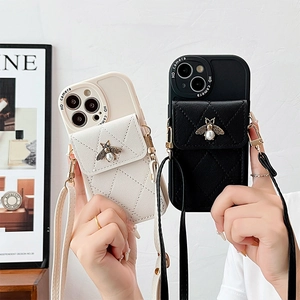 Quilted leather iPhone case with pearl bee detail, card wallet and crossbody strap