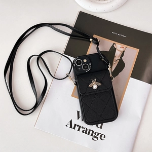 Crossbody black leather iPhone case with quilted wallet, pearl bee charm and long strap