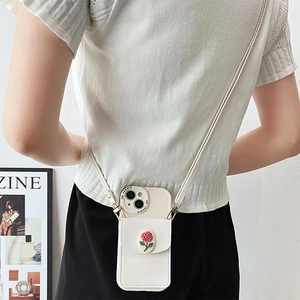 White leather iPhone crossbody case featuring a 3D pink rose and card holder wallet pouch