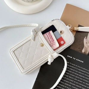 Detail of white quilted leather phone wallet case with card slot and stylish tassel