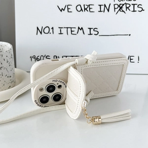 Detail of cream leather iPhone case with quilted wallet card holder and tassel strap