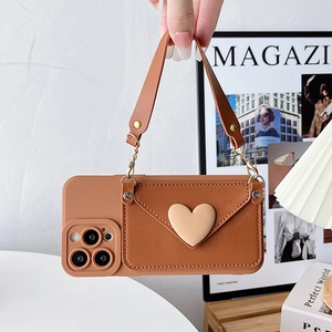 Brown PU leather crossbody iPhone case with heart envelope wallet and hand strap accessory
