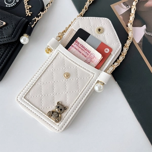 White quilted phone card case with diamond bear charm and gold chain strap