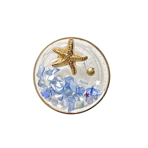 Round glitter starfish phone socket stand with blue and white ocean resin aesthetic