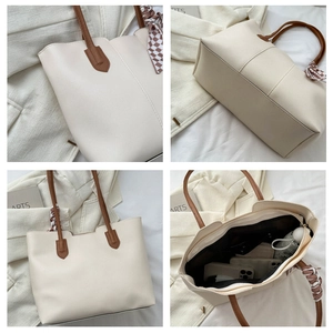 Detail of beige tote bag with brown handles and checkered silk scarf accessory