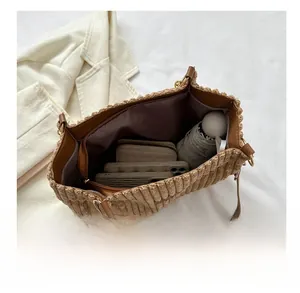 Top view of brown corduroy tote bag interior showing large capacity for daily items