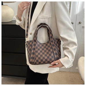 Retro monogram tote bag in dark coffee checkerboard pattern with adjustable strap detail