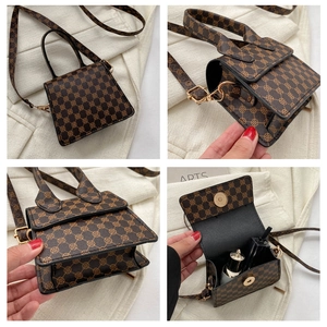 Detail of vintage patterned crossbody bag showing magnetic closure and interior space