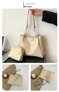 Details zur cremefarbenen Shopper-Tasche mit Krokoprägung, Kette und stilvollem Design