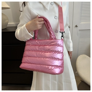 Pink quilted metallic crossbody bag for women with glossy finish and shoulder strap